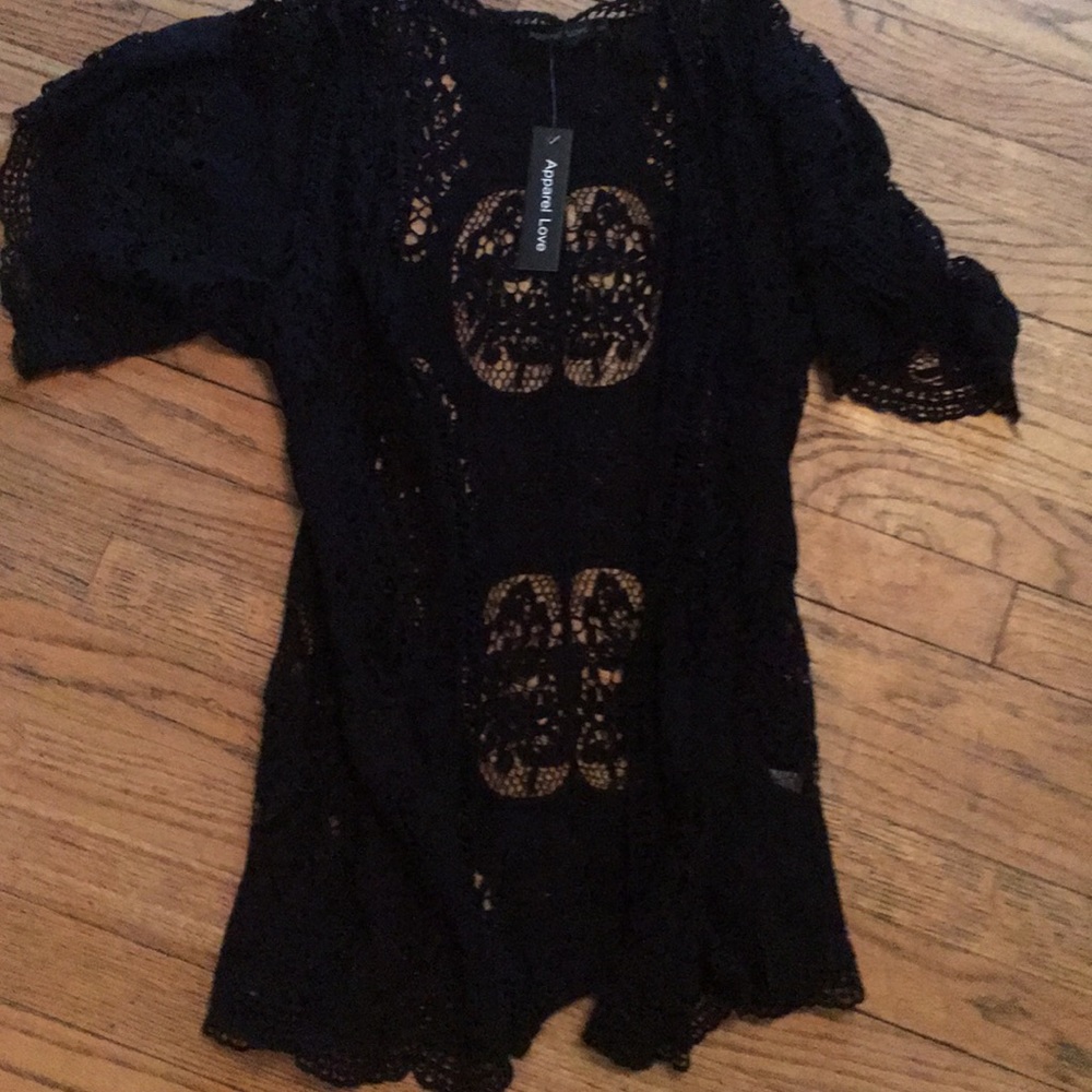 Brand new woman’s opening sweater size s